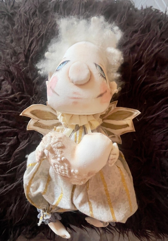 Pixie's offering to the project, a fabric pixie made their friend's mum.