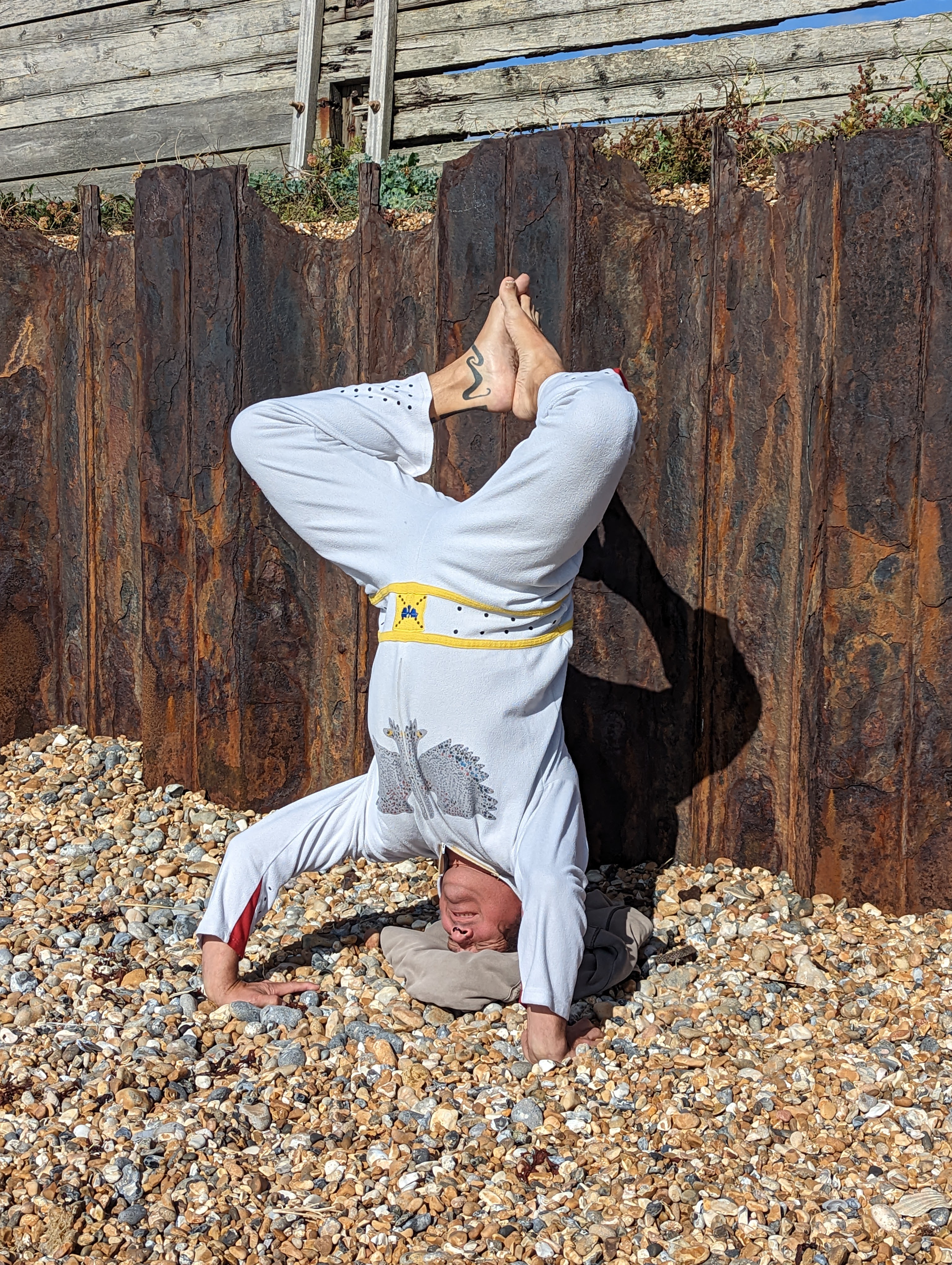 Carl in Elvis style onesie - headstand.
