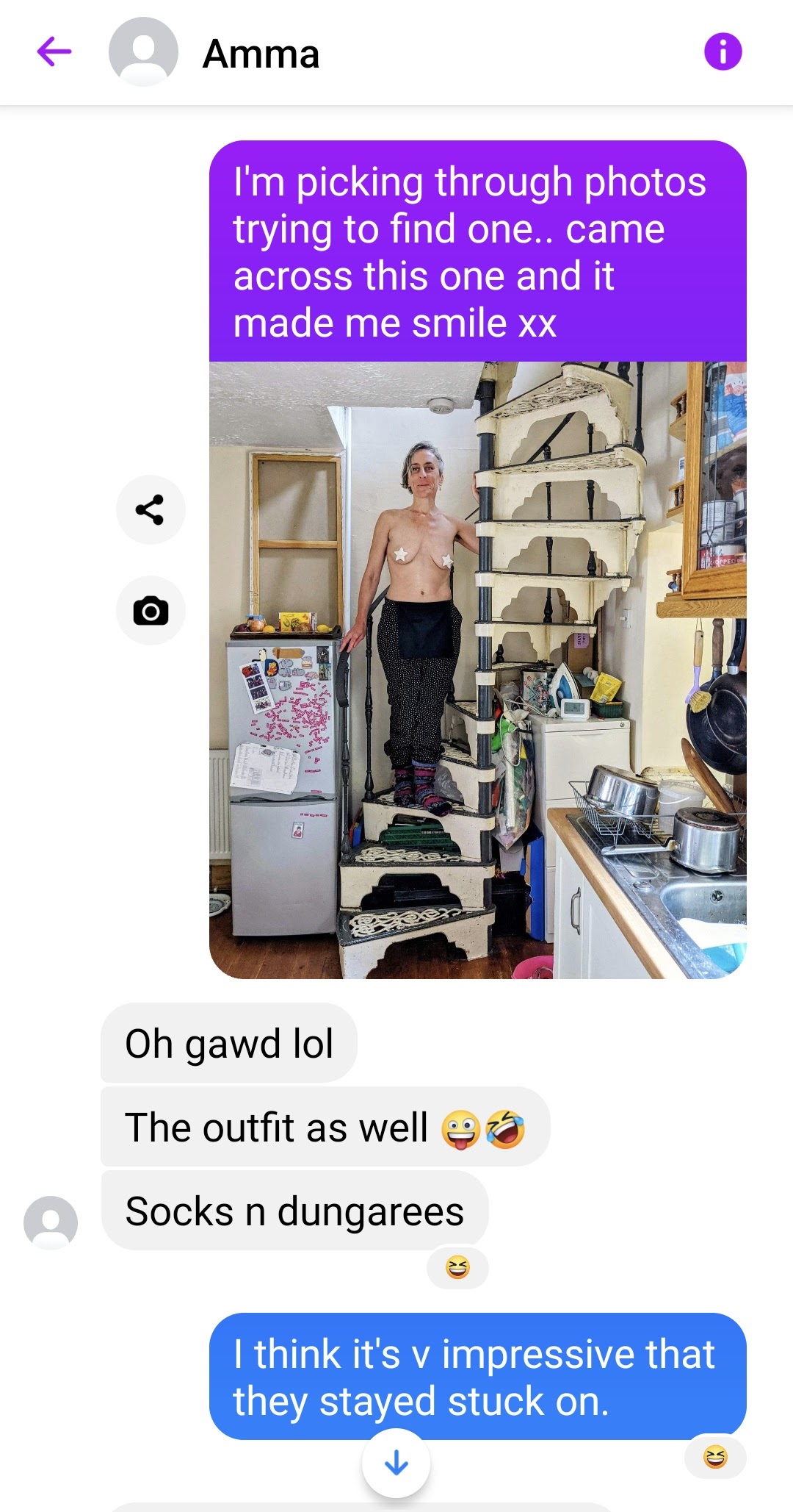 Amma on stairs with nipple stars.