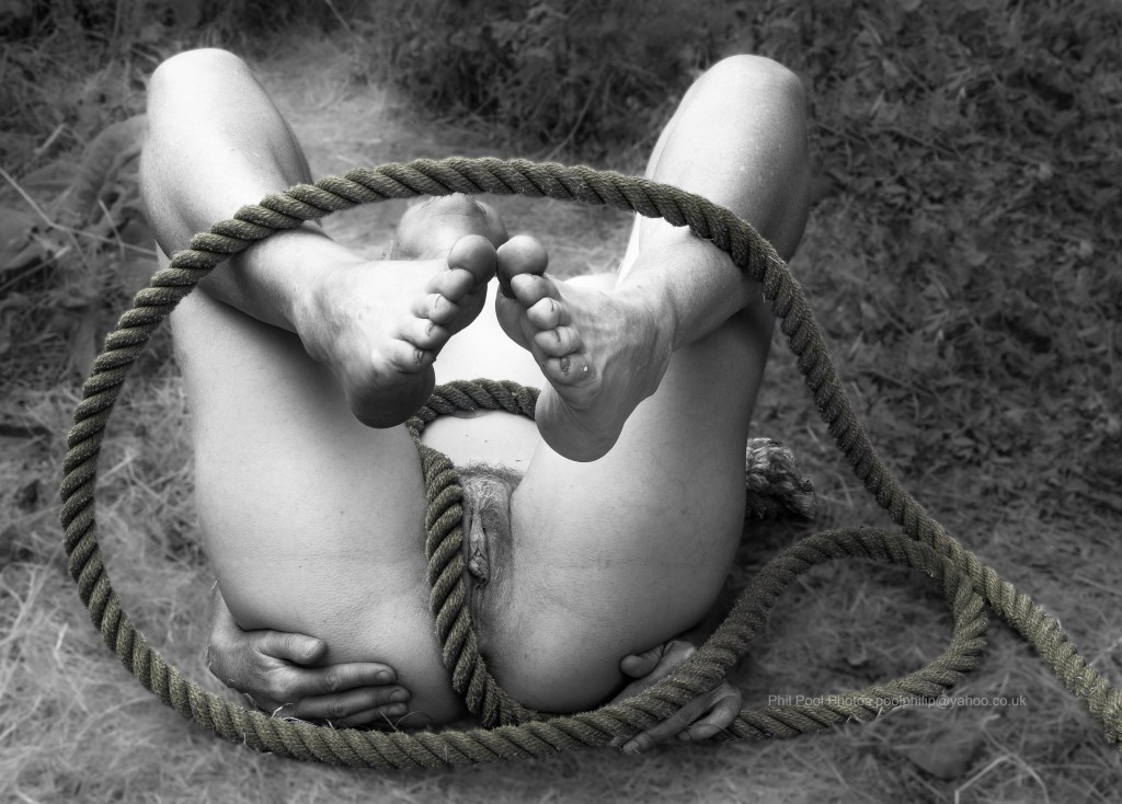Jan naked with rope.